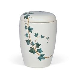 Urna cerâmica com folhas verdes